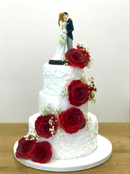 Foto Tarta floral con rosas rojas