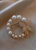 Foto Broche con perlas